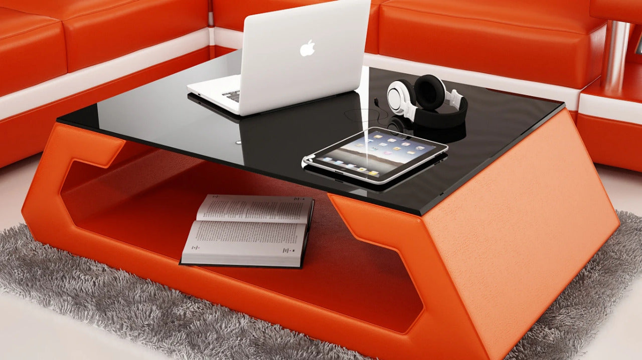 Leatherette Coffee Table: Modernized Orange Leatherette Coffee Table W/Black Glass Table Top